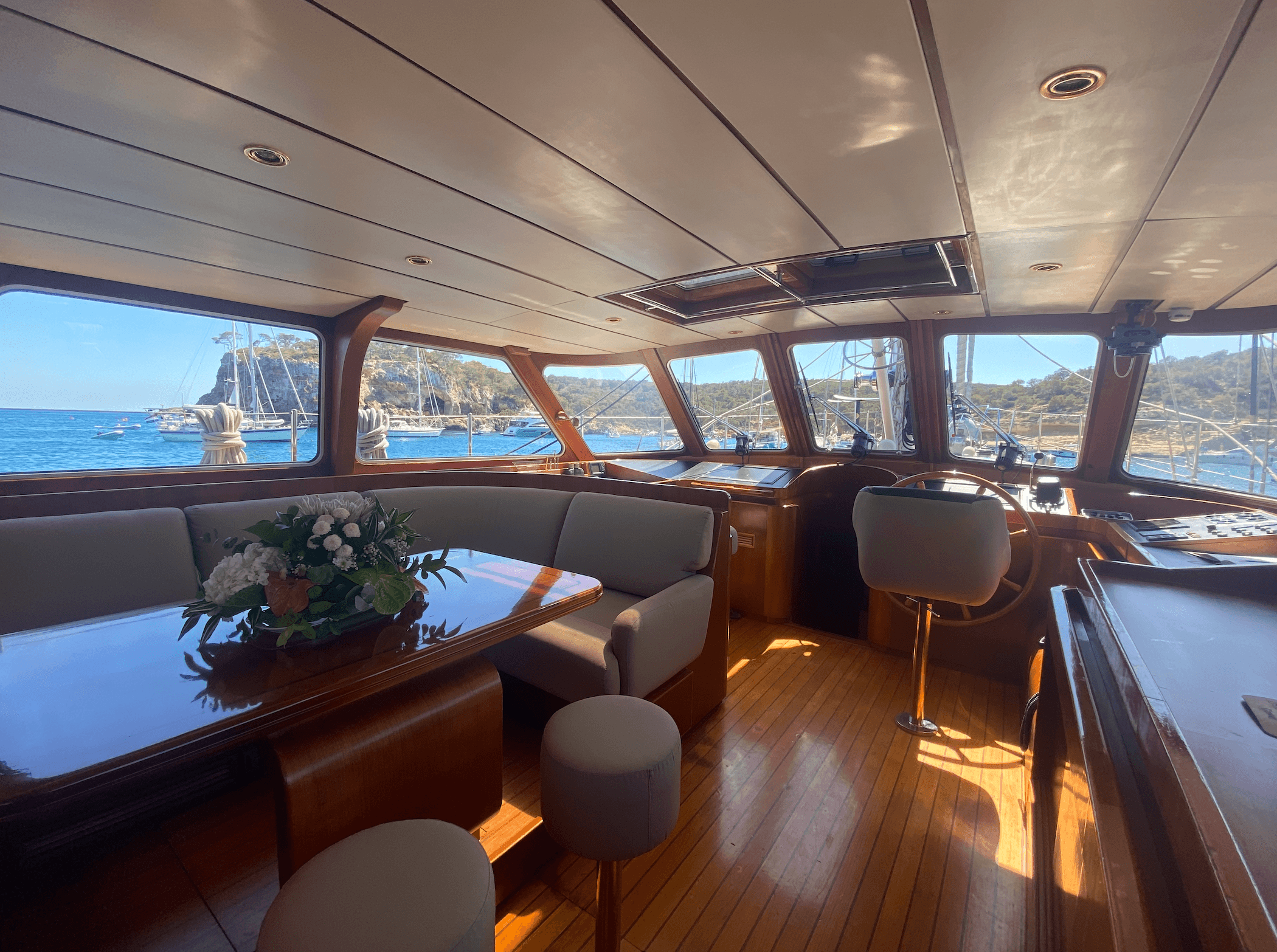 Professional captain and crew of SV Iron Monkey yacht on deck